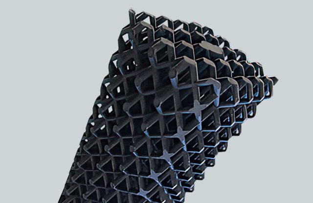 Black plastic formed into a mesh structure