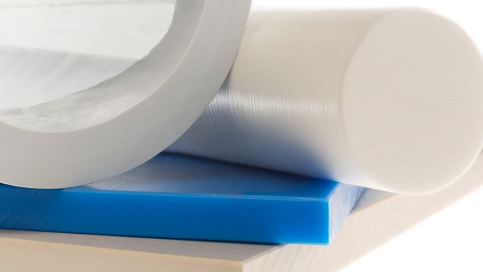 Engineering plastic stock shapes including a tube, a rod, and plates